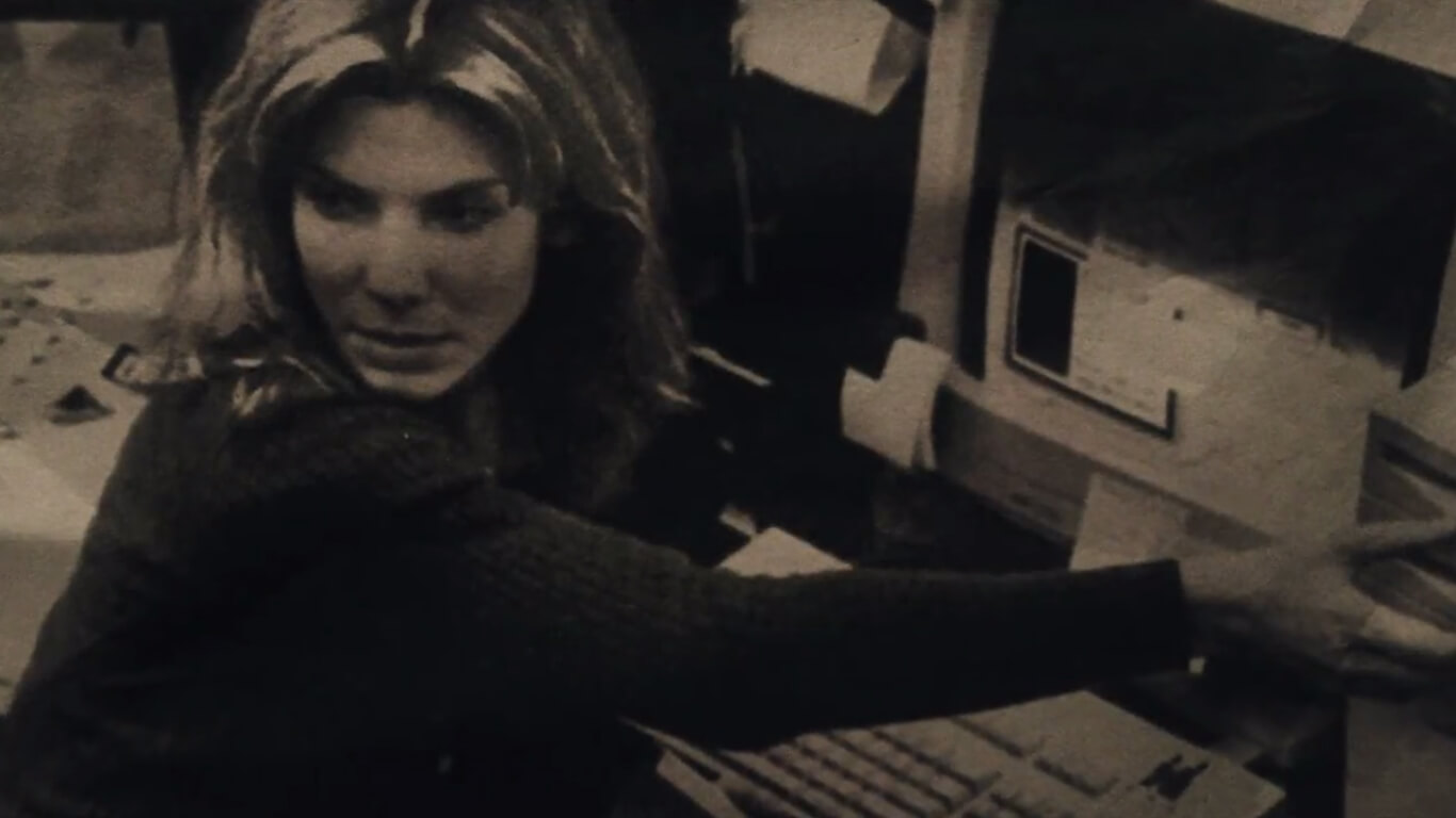 net neutrality. screenshot of Sandra Bullock and an old computer.
