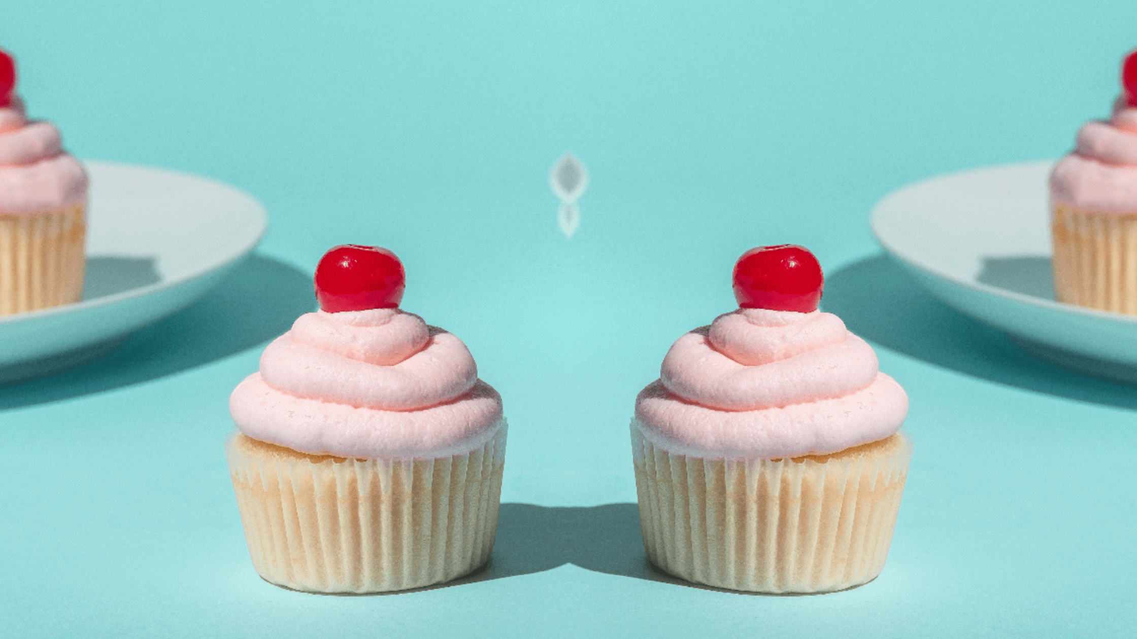 Two cupcakes that look like breasts
